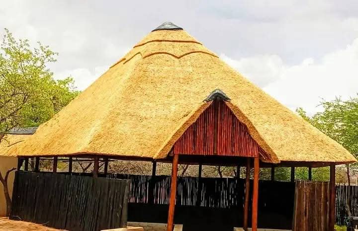 Completed thatched roof structure by TACTIC
