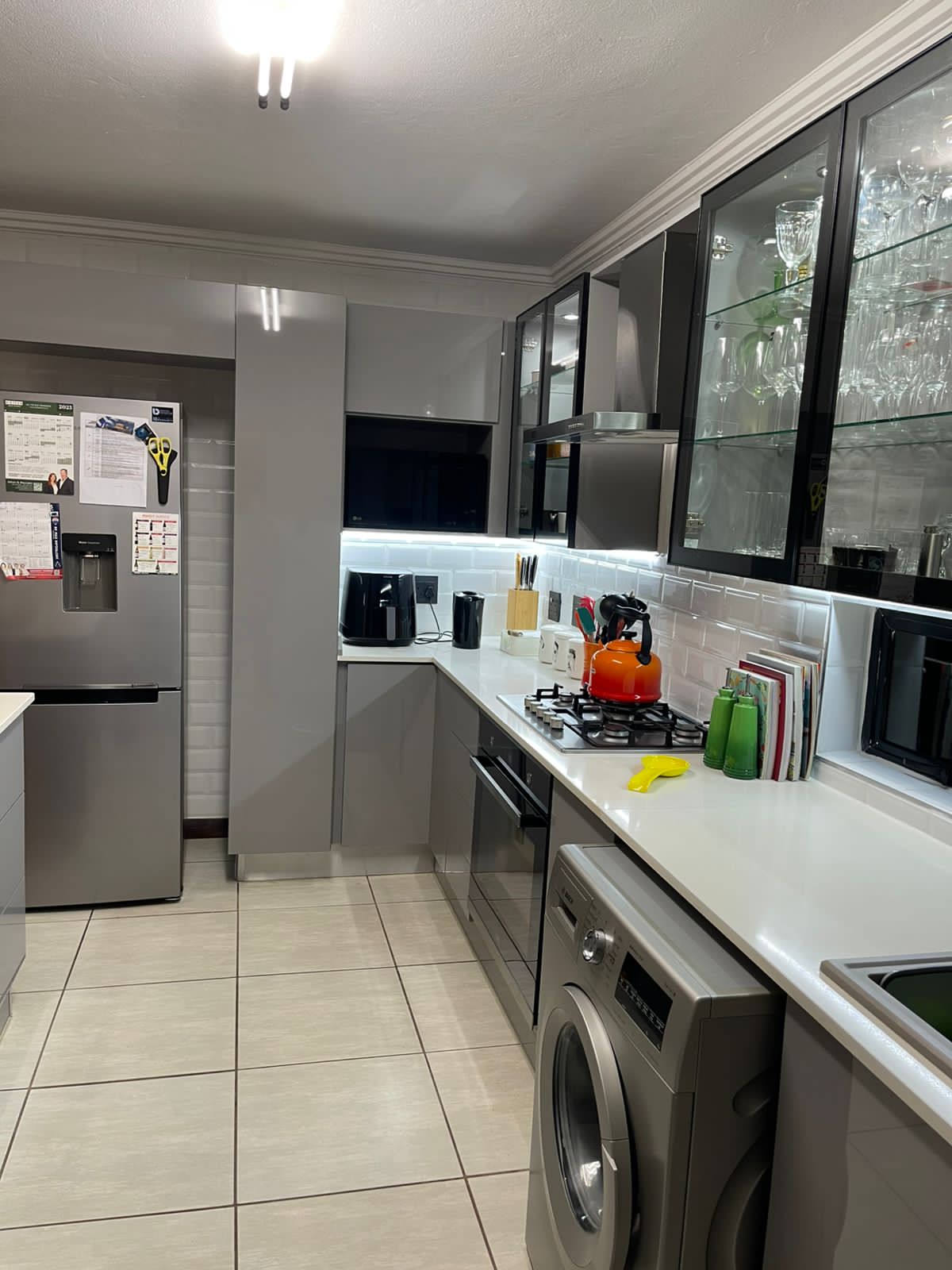 Modern fitted kitchen and island